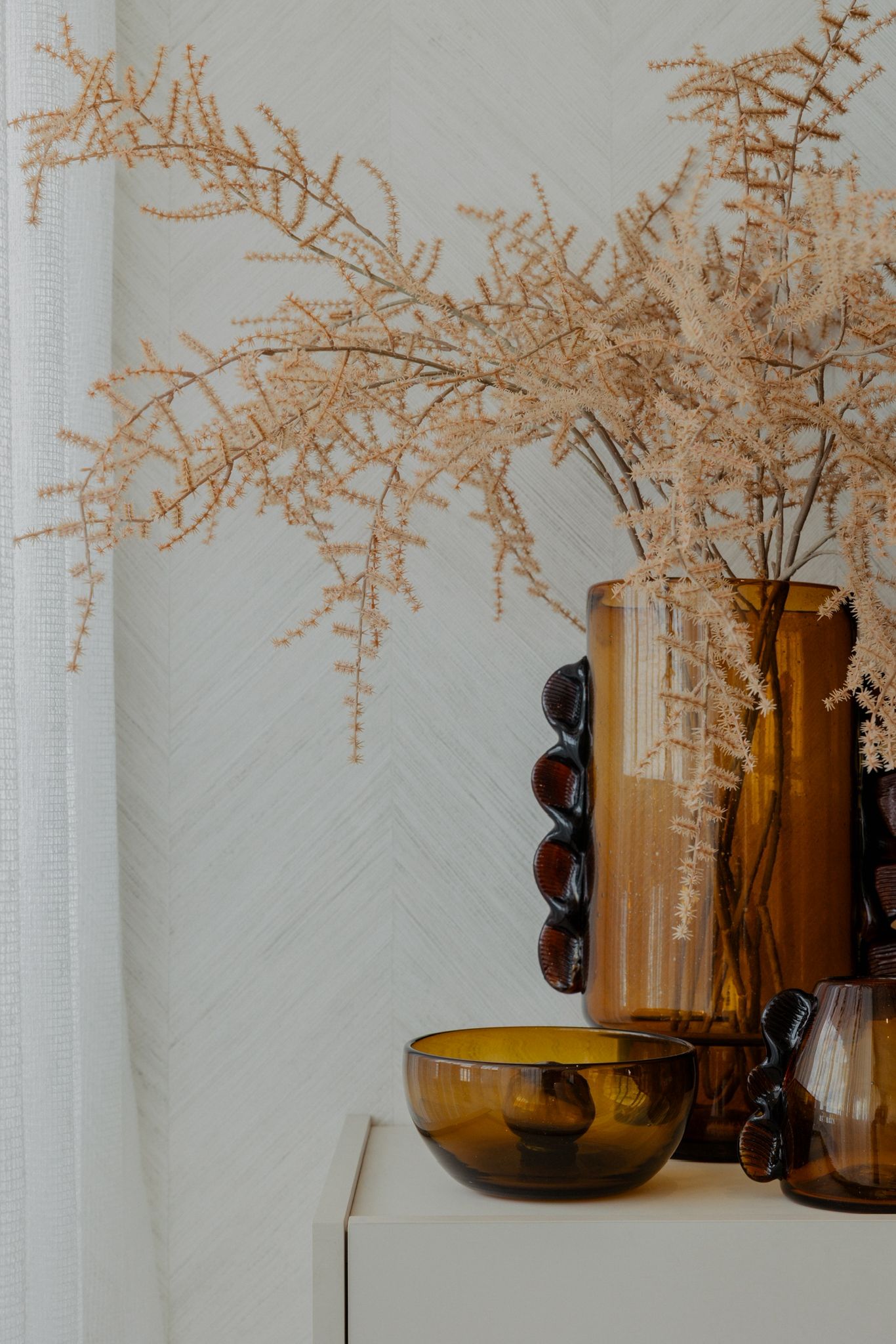 Kitchen counter detail with brass tap.